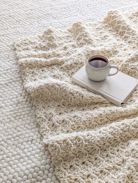 A chunky weight crochet blanket with a hot cup of tea. Best Crochet Stitch For Super Bulky Yarn, Crochet Blanket One Day, Crochet Blanket Simple Easy Patterns, Crochet Soft Blanket Patterns, Large Hook Crochet Blanket, Yarn Bee Alpaca Twist Crochet Pattern, Crochet Stitch For Thick Yarn, Crochet Blanket For Adults, 2 Strand Crochet Blanket