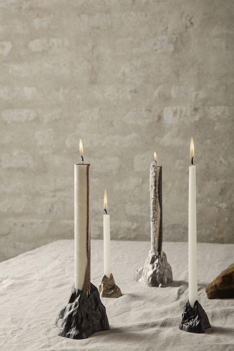 Invite organic, earth-inspired shapes into your home with our Stone Candleholders. Formed after the rough stone of a mountainside, the candleholder is made from casted metal and has a matte finish that compliments its jagged silhouette. Stone Candle Holder, Stone Candles, Large Candle Holders, Small Candles, Candle Holder Set, Burke Decor, Ferm Living, Metal Casting, Candle Set