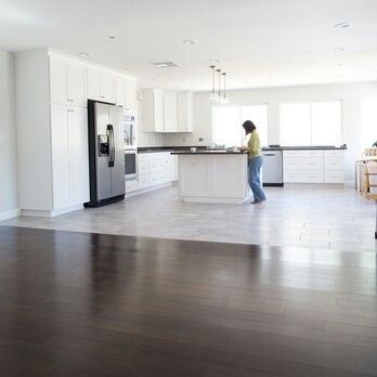 Dark wood to light tile transition. Would work for both Scotty and I. Maybe with dark cabinets since he doesn't like white cabinets. Tile To Wood Transition, Modern Kitchen Flooring, Transition Flooring, Vinyl Flooring Kitchen, Wood Floors Wide Plank, Wood Tile Floors, Dark Wood Floors, Kitchen Floor Tile, Dark Cabinets