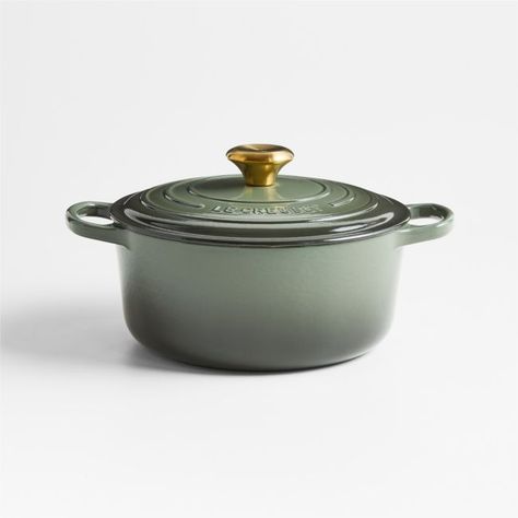 A fresh, earthy new hue inspired by thyme, exclusively at Crate & Barrel. Enamel in warm grey-green glazes this Dutch oven with a smooth, shock-resistant finish, making it impervious to acid, alkali, odors and stains. Maintaining consistent heat, the pot has a smooth interior that promotes caramelization and a close-fitting lid that creates a blanket of heat for moist and even cooking. The Dutch oven is compatible with all types of heat sources, from gas and induction stoves to outdoor grills. T Le Creuset Dutch Oven, Panang Curry, Olive Bread, Induction Stove, Outdoor Grills, Crate Barrel, Glass Food Storage, Professional Chef, Kitchen Cookware