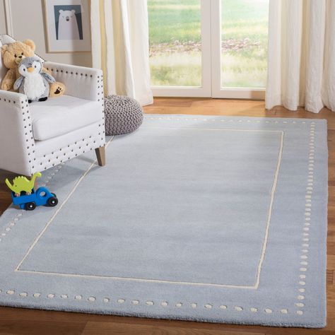 Lend plush comfort to your decor with this stylish area rug. Hand-tufted from wool, the area rug features a double border design with a solid stripe interior border, and an abstract dot exterior border. Light Blue Nursery Boy, Nursery Rugs Boy, Art Motifs, Nursery Boy, Solid Color Rug, Boys Nursery, Blue Nursery, Twins Room, Stylish Rugs