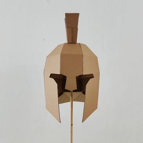 ancient greek helmet made out of cardboard. This is base form, means you can modify it into Spartan helmet, centurion, or achilles. PS. Template available on the web. check my bio Any idea what should I make next? Ancient Greek Helmet, Base Template, Greek Helmet, Cardboard Toys, Spartan Helmet, Cardboard Art, Corrugated Cardboard, Cardboard Crafts, Printable Patterns