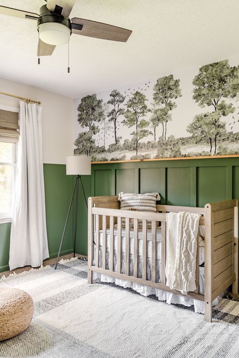 A baby boy nursery gets a woodland themed makeover with deep green, cozy lighting, and peel & stick watercolor style wall mural on a budget. Green And Grey Nursery, Nursery Makeover, Green Painted Walls, Cozy Lighting, Board And Batten Wall, Baby Room Inspiration, Baby Boy Room Nursery, Green Nursery, Nursery Room Inspiration