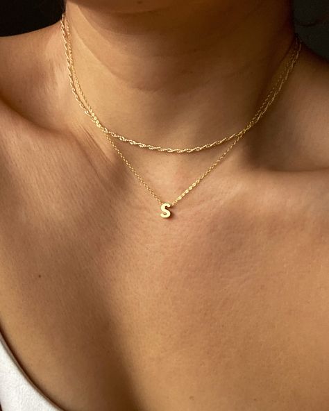 Little letters, BIG impact. The Alphabet Necklace is the perfect way to represent your initial, or your loved ones, in a delicate way. It stacks perfectly with our range of everyday necklaces, found here. Our Alphabet Charms are sliders but not removable from our chains, perfect for those who love to fidget with their pendants. Details: Choose between 14k Gold Vermeil, White Gold vermeil, or Rose Gold vermeil Adjustable at 42cm and 45cm lengths. Hand made by manual wax casting to give it a sligh Initial Necklace Stack, Everyday Initial Necklace, Cute Necklace Stacks, Gold Jewelry Necklace Stack, Simple Necklace Stack, Everyday Necklace Stack, Stacked Jewelry Necklaces, Necklace Stacking Gold, S Necklace Initial