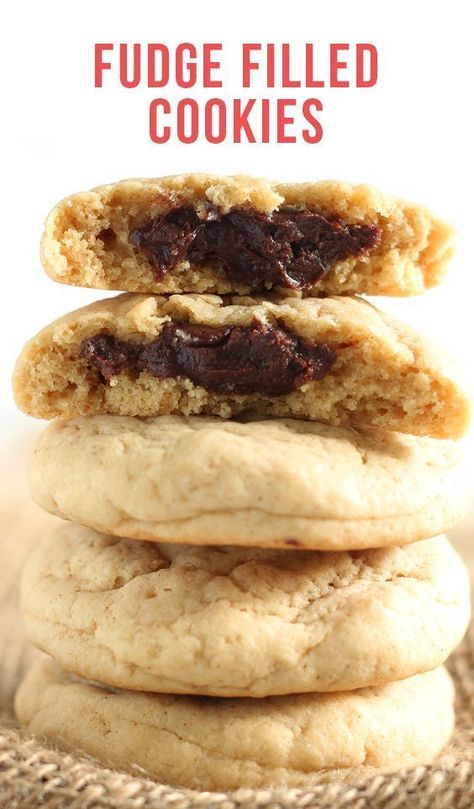 Fudge Filled Cookies are ultra soft and tender brown sugar cream cheese cookies with a secret rich chocolate fudge filling inside. As tasty as they are fun! #fudgefilled #dessert #cookierecipes #bestcookie #fudge #cookie #fudgefilledcookie Fudge Stuffed Cookies, Fudge Filled Chocolate Chip Cookies, Fudge Filled Cookies, Chocolate Fudge Filling, Brown Sugar Cookies, Stuffed Cookies, Handle The Heat, Cream Cheese Cookies, Filled Cookies