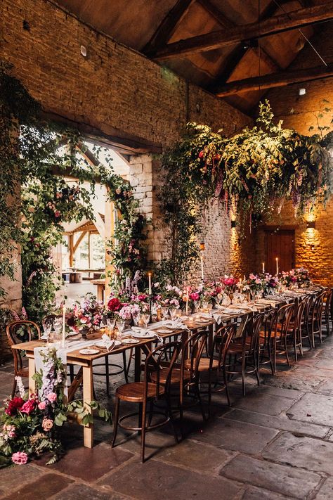 One long banquet table for an intimate wedding decorated with pink and purple flowers and candles for cosy romantic wedding Botanical Wedding Decor, Botanical Wedding Theme, Long Table Wedding, Wedding Sign Decor, Wedding Venues Uk, Summer Wedding Outdoor, Rustic Wedding Venues, Spring Wedding Flowers, Rock My Wedding