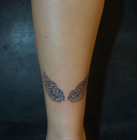 Angel Wings Tattoo On Back Of Leg, Angel Wings Tattoo On Achilles, Wing Tattoo Placement Ideas, Angel Wings Tattoo On Leg, Pretty Angel Wings Tattoo, Angel Wings On Back Tattoo For Women, Feather Angel Wings Tattoo, Two Wings Tattoo, Shaded Angel Wings Tattoo