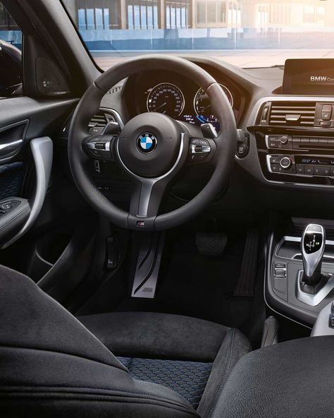 Putting the emphasis on a sporty atmosphere. The interior of the BMW M140i is equipped with sport seats, M leather steering wheel, M… Bmw M140i, Bmw 116i, Bmw 320d, Bmw Interior, Bmw 540i, Bmw M1, Leather Steering Wheel, Bmw Motors, Expensive Jewelry Luxury