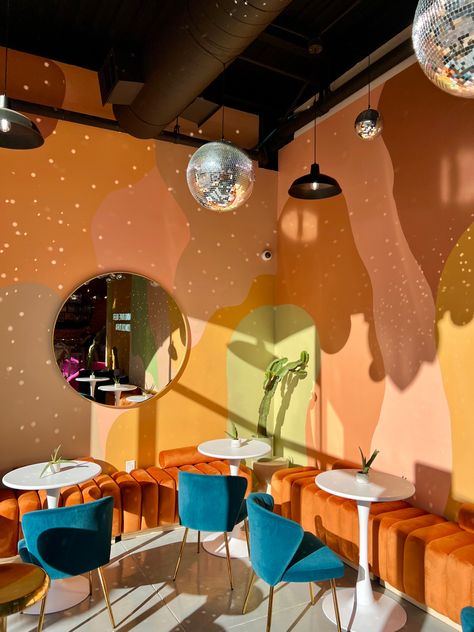 Funky Reception Area, Funky Cafe Interior Design, Groovy Cafe Aesthetic, Restaurant Interior Design Colorful, Bold Colour Interior, Inspiring Interior Design, Dispensary Design Interiors, Funky Cafe Design, 70s Restaurant Design