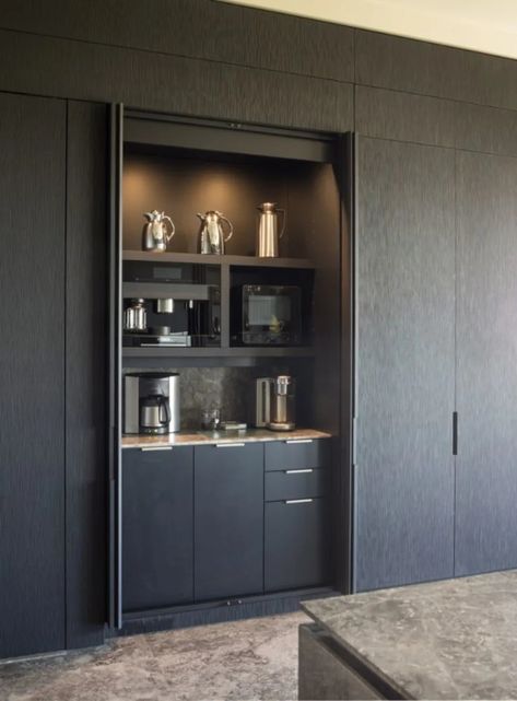 eggersmann pocket door units are incredibly flexible. They can be customized in width, depth, height and operate fluidly at any size. The ability to create multipurpose spaces without making your cabinetry look like it is out of place is just one use. Build in your favorite coffee bar, beverage center, desk area, buffet, or even conceal your ovens. Challenge us to create a pocket door solution for your special need. Hidden Coffee Bar, Kaffe Station, Built In Coffee Bar, Coffee Bar Ideas Kitchen Counter, Coffee Station Kitchen, Coin Café, Coffee Area, Coffee Bar Station, Coffee Bar Ideas