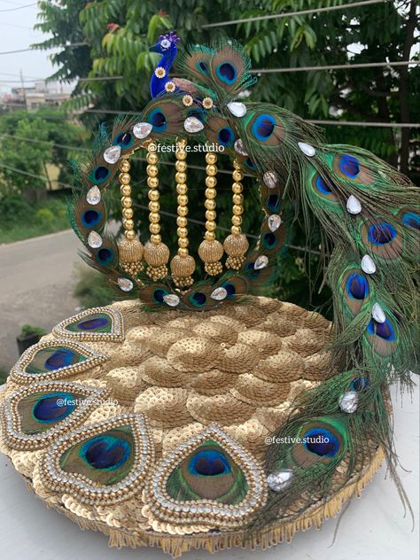 Customised Singhasan for laddu gopal 😍 DM for bookings now ✨ Shipping WORLDWIDE 🌍 Contact us on +919410477888 DM for bookings and details only at @festive.studio #janamashtami #krishna #laddugopal #krishnajanmashtami #krishnalove #peacockfeather #handmadedecor #culturalgifts Singhasan For Ladoo Gopal, Ladu Gopal Jhula Decoration, Laddu Gopal Singhasan, Handicrafts Ideas, Engagement Tray, Handmade Decorative Items, Ring Platter, Peacock Crafts, Durga Mantra