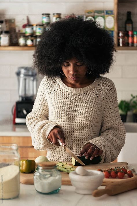 Beautiful black woman cooking in her home. Cooking concept. Thermomix, Cooking Aesthetic Girl Black, Female Cooking Aesthetic, Cooking Reference Photo, Home Cook Photography, Cooking In The Kitchen Photography, Black Woman Journaling Aesthetic, Branding Photos In Kitchen, Black Girls Cooking Aesthetic