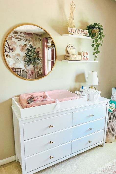 Decor inspo for a cute baby girl nursery: floral, blush and gold Nursery Changing Table Wall Decor, Mobile Home Nursery Ideas, Above Nursery Dresser Decor, Above Changing Table Decor, Nursery Dresser Ideas, Baby Girl Nursery Theme, Nursery Ideas For Girls, Nursery Room Decor Ideas, Nursery Wall Decor Ideas