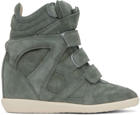 High-top suede sneakers in blue. · Perforated detailing at toe · Adjustable velcro straps at vamp · Padded tongue · Quilted collar · Grained leather lining · Covered wedge heel · Treaded rubber sole · Heel: H3 Supplier color: Sea green Shoe Inspo Sneakers, Cute Sneakers For Women, Quilted Collar, Heeled Sneakers, Ugg Coquette, Sneaker Wedges, Isabel Marant Sneakers, Isabel Marant Shoes, Sneakers Heels