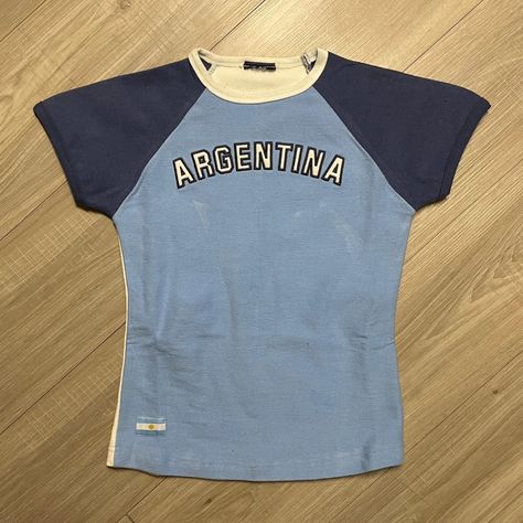 Argentina Baby Tee Soccer Jersey Shirt. Great... - Depop Argentina Tshirt Outfit, Vintage Argentina Jersey, Soccer Tee Outfit, Soccer Jersey Fashion, Argentina Jersey Outfit, Outfit Argentina Bariloche, Soccer Jersey Aesthetic, Brazil Baby Tee, Baby Tees Aesthetic