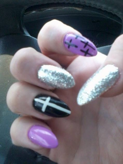 Purple and silver stiletto nails with a cross pattern accent nail and a black with white cross accent nail Nail With Cross, Nails With A Cross, Silver Stiletto Nails, Pastel Goth Nails, Accent Nail, Awesome Nails, Goth Nails, Purple And Silver, White Cross