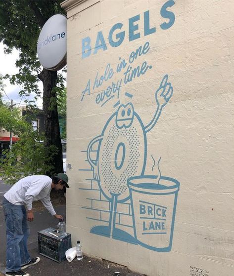 Mitch.R Signs on Instagram: "Had some fun painting this wall sign yesterday for @bricklane.bagels in south Melbourne! Designed by @sebgodfrey :)" Burger Graffiti, Bagel Illustration, Donuts Logo, Fun Restaurant, Cafe Branding Design, Bagel Cafe, Green Cafe, Window Signage, Coffee Shop Branding