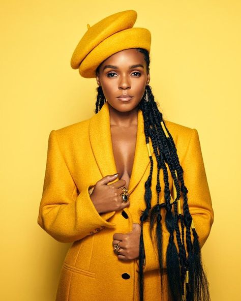 Giving up her usual black and white, Janelle Monáe rocks three full yellow outfits for her Variety photoshoot. This oversized coat, styled with two yellow berets, was designed by Anouki. Made from wool, this long line coat is designed with a shawl collar, dual seam pockets and long sleeves is a dream. Pebble Ring, Janelle Monae, Janelle Monáe, Women Issues, Yellow Aesthetic, Cate Blanchett, Style Noir, Mellow Yellow, Yellow Background