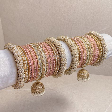 Celine Luxury Pearly Bangle Set - Pink - SOKORA JEWELSCeline Luxury Pearly Bangle Set - PinkBANGLES Pink Indian Jewelry Set, Bridal Bangle Set Indian, Antique Gold Bangles, Pink Bangles, Bridal Jewelry Sets Brides, Wedding Jewelry Sets Bridal Jewellery, Thread Bangles Design, Indian Bridal Jewelry Sets, Jewelry Set Design