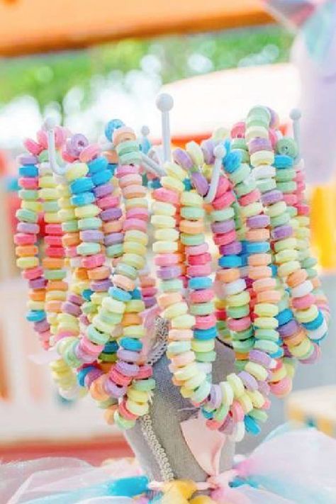 Another fun party favor for a rainbow birthday are some colorful candy bracelets. Place some on your dessert table or even your gift table so your guests can just grab one to wear.See more party ideas and share yours at CatchMyparty.com Rainbow Themed Party Ideas, Rainbow Carnival Party, Princess Rainbow Birthday Party, Rainbow Two Year Old Party, Flowers And Rainbows Birthday, Rainbow Goodie Bags, Rainbow Birthday Party Favors, Rainbow Themed Birthday Party Ideas, Rainbow Aesthetic Birthday Party