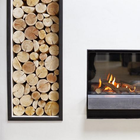 Stacked decorative logs from The Log Basket - displayed in an alcove of a stylish, modern fireplace. As seen in the Edinburgh showroom of Bonk&Co (fire / stove specialists). Our logs are for display purposes, so keep a stash of firewood nearby...or install a stack of our logs next to a fake woodburner or electric fire. Convince everyone it's real! (Image via www.bonkandco.com) Logs Next To Fireplace, Fake Woodburner Fireplace, Logs In Fireplace Decorative, Wood Storage Fireplace, Elevation Rendering, Gas Fireplace Ideas, Spa Plan, Faux Logs, Gas Fireplace Ideas Living Rooms