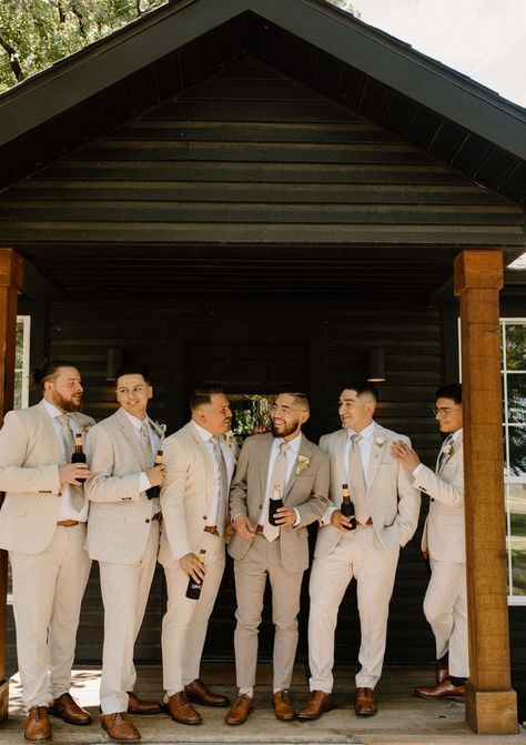 Groomsman Neutral Colors, Groomsmen Tuxedo Wedding, Tan Bridal Party Groomsmen, Taupe Mens Wedding Attire, Groom And Groomsman Suit, Groomsmen No Tie With Jacket, Groomsmen Light Brown Suits, Tan Wedding Tuxedo Groom Attire, Different Groom Suit