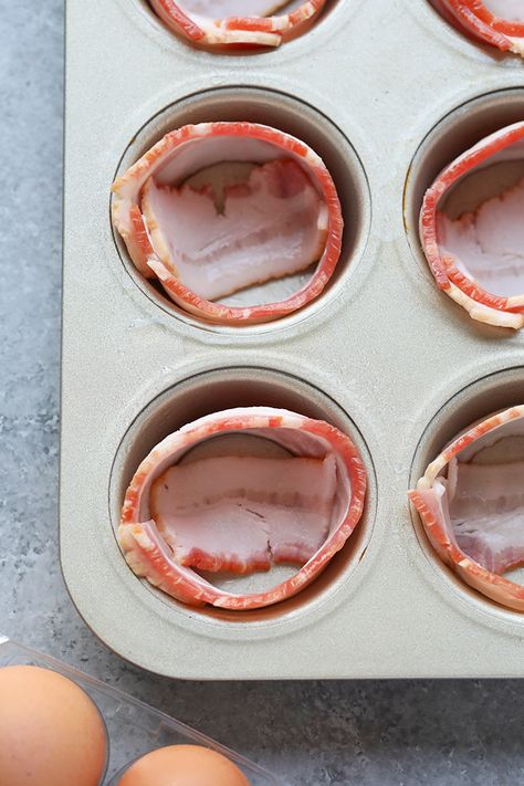 In less than 30 minutes you'll have a high-protein breakfast or snack prepped for the entire week! These bacon baked eggs are made with just 2 ingredients and are gluten-free and paleo-friendly. Bacon Wrapped Eggs, Bacon Wrapped Egg Cups, Egg And Bacon Muffins, Bacon Breakfast Cups, Egg Bacon Muffin Cups, Egg Cups Breakfast Healthy, Bacon Cups With Eggs, Bacon And Egg Cups, Bacon Cups With Eggs Muffin Tins