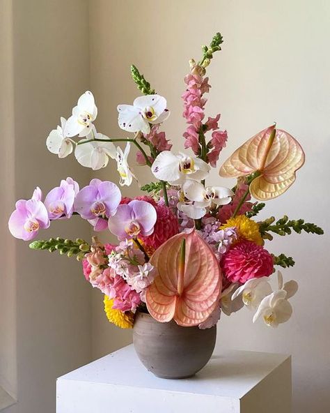 Flower Arrangement With Orchids, Contemporary Floral Arrangements, Edgy Floral Arrangements, Puni Petals, Tropical Orchid Bouquet, Aesthetic Flower Arrangement, Colorful Orchid Bouquet, Ethereal Floral Arrangements, Groovy Flower Arrangement