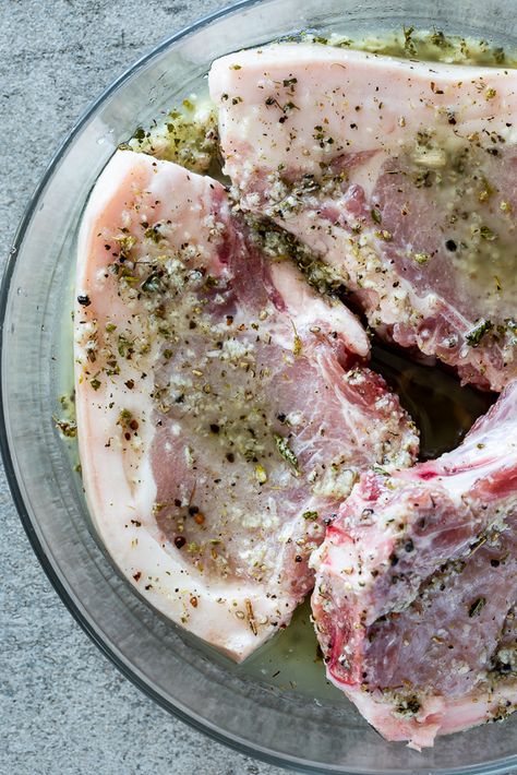 Greek Style Pork Chops, Greek Pork Chops, Greek Pork, Simple Marinade, Rosemary Salt, Marinated Pork Chops, Pork Entrees, Olive Oil Garlic, Squeezed Lemon