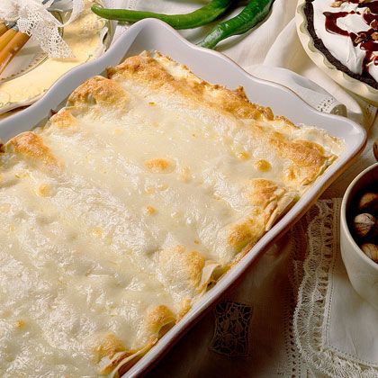 Our Editors' Favorite Southern Living Casserole Recipes Creamy Chicken Enchiladas Recipe, Favorite Casserole Recipes, White Chicken Enchiladas, Creamy Chicken Enchiladas, Chicken Enchiladas Easy, Chicken Enchilada Recipe, Enchilada Recipes, Weeknight Dinner Recipe, Chicken Enchiladas