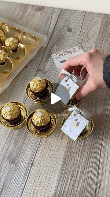 Rubbia on Instagram: "Chocolate Wedding Favours   #chocolatefavors #fyp #wedding #weddingday #weddingfavors #weddinginspiration #ideas #favors #partyfavors #ferrerorocher #personalised #gifts #minitreats #byrubbia #london #instadaily #instamood #giveaway" Chocolate Favours Wedding, Ferrero Rocher Wedding Favors, Chocolate Giveaways Ideas, Ferrero Rocher Favors, Diy Party Favors For Adults, Ferrero Rocher Gift Ideas, Wedding Giveaways Ideas Souvenirs, 50th Wedding Anniversary Favors, Ferrero Rocher Gift