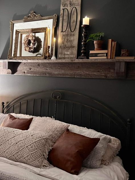 Styling Shelf Above Bed, Shelf Over Master Bed, Dark Farmhouse Decor Bedroom, Headboard Decor Ideas, Mantle Over Bed, Over The Bed Shelving, Mantel Headboard Ideas, Headboard Shelf Decor, Shelves Above Headboard