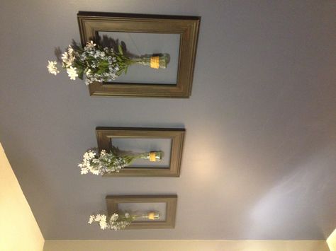 Three frames on the wall with flowers in vase. Love this look and it was not too difficult to do. Wall With Flowers, Perth House, Wall Vase Decor, Orchid Vase, Metal Flower Wall Decor, House Wall Design, Hanging Terrarium, Vase Display, Flowers In Vase