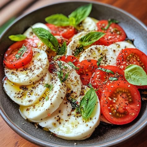 --- 🍅🥗 *Caprese Salad Recipe* 🥗🍅 Refreshing and full of flavor, Caprese Salad is a must-have in Italian cuisine! Here's how to prepare it: *Ingredients :* - Ripe tomatoes - Fresh mozzarella - Fresh basil - Extra virgin olive oil - Salt and pepper *Instructions :* 1. Cut the tomatoes and mozzarella into slices. 2. Arrange them alternately on a dish. 3. Add basil leaves between the slices. 4. Drizzle with olive oil, then season with salt and pepper. 5. Serve chilled and enjoy! Enjoy your f... Italian Mozzarella And Tomatoes, Tomato And Mozzarella Salad, Italian Caprese Salad, Cooked Shrimp Recipes, Tomatoes And Mozzarella, Salad Recipes Lunch, Caprese Salad Recipe, Healthy Food Dishes, Bbc Good Food Recipes