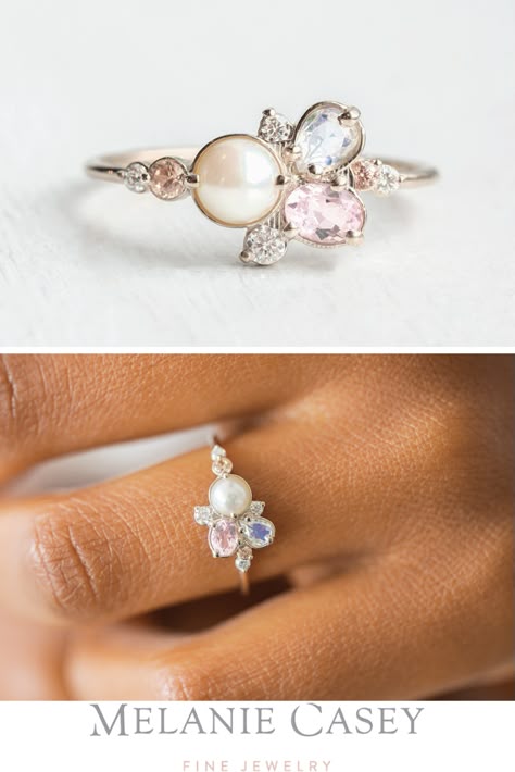 The Pearl Sands Ring features a cluster of gemstones, including an Akoya pearl, a moonstone, a morganite, peach zircon, and white diamonds. Available now in 14k white gold at melaniecasey.com! Pearl Diamond Sapphire Ring, Custom Pearl Ring, Pearl Cluster Engagement Ring, Pearl And Birthstone Ring, Pearl And Moonstone Ring, Pearl Ring With Diamonds, Pearl Ring Settings, Unique Engagement Rings Pearl, Multicolor Engagement Rings