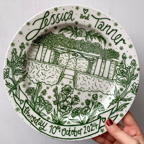 This custom green wedding plate is for @jessquiz ✨💗 thank you so much for such beautiful inspiration to create your plate! ✨💗🏠 A custom green illustration on a 27cm rimmed plate which has successfully been delivered in one piece to the USA! ✨💚 Commissions are open🤍✨⭐️ #art #artist #ceramics #pottery #painting #illustrator #ceramicstudio #potterytiktok #potterypainting #painter #potteryart #ceramicpainter #floral #bisqueware #weddinginspiration #creative #smallbusiness #smallbusinessowner ... Painted Pottery Serving Tray, Wedding Plate Painting Ideas, Painted Plates Diy, Porcelain Paint, Wedding Platters, Wedding Plate, Mom Crafts, Green Illustration, Hand Painted Plate