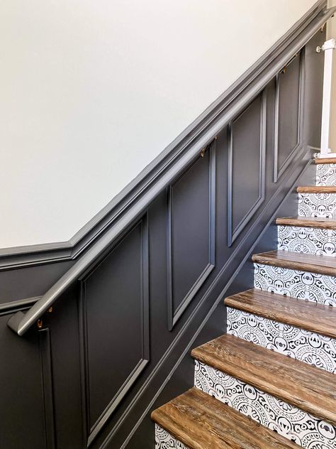 DIY Moody Staircase Shadow Box Trim Stairwell Wainscoting Staircases, Wainscoting Ideas Black, Wall Wood Paneling Ideas Stairs, Basement Stairwell Wainscotting, Stair Railing Ideas On Wall, Wall Trim On Stairs, Decorating Closed Stairway Walls, Stairway Trim Wainscoting, Wall Paneling Stairway