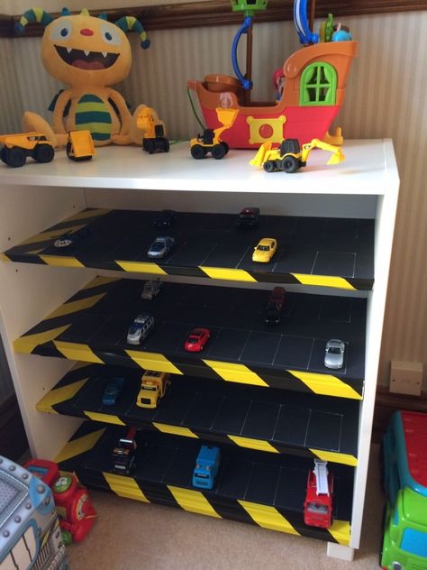 Sonny boy loves the toy car park and I don't trip over tiny cars in the kitchen anymore! Hot Wheels Display Case, Toy Car Garage, Toy Car Storage, Hot Wheels Display, Diy Kids Furniture, Sonny Boy, Boys Playroom, Toy Garage, Cars Room