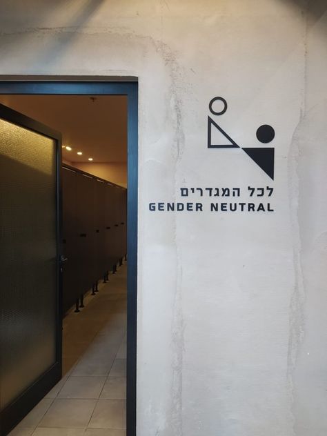 Designing around Debate: The Gender-Neutral Bathroom | ArchDaily Gender Neutral Restroom Signage, Gender Neutral Restroom Sign, All Gender Bathroom Sign, Unisex Kids Bathroom Ideas, Gender Neutral Bathroom Signs, Gender Neutral Toilets, Restroom Signage, Neutral Bathrooms Designs, Gender Neutral Bathrooms