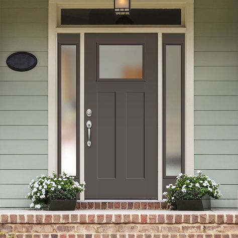 Bring the beautiful look of wood and the performance of fiberglass to your home with the Masonite Fiberglass Entry Door. Engineered to last a lifetime, these high-performance surface doors feature high-definition profiles for added architectural interest. Designed with an energy saving polyurethane door core, the maintenance-free proprietary fiberglass construction provides maximum protection and durability. Masonite 64-in x 80-in Fiberglass Craftsman Right-Hand Inswing Timber Gray Painted Prehu Craftsman Style Front Door, Craftsman Style Front Doors, Door Core, Front Door Replacement, Front Door With Sidelights, Black Exterior Doors, Door With Sidelights, Interior Front Door, Fiberglass Entry Doors