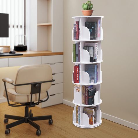 PRICES MAY VARY. Build to Last: Our rotating bookshelf is made of premium PVC with a thickness of 0.47 inches and stainless steel make this bookcase strong, so it can better keep beautiful and practical. 360° Rotating Bookcase: The steel ball bearing enables the product to rotate 360 degrees with less noise, allowing you to get what you want while sitting. The arc-shaped baffle in each compartment can also effectively prevent your items from falling. Large Capacity: The five tiers, 20 compartmen Revolving Bookshelf, Round Bookshelf, Bookshelf Corner, Rotating Bookshelf, Narrow Bookshelf, Revolving Bookcase, Bookshelf Organization, Corner Bookshelves, Living Room Study