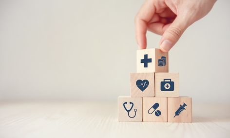 Health insurance concept, reduce medical... | Premium Photo #Freepik #photo #health-plan #health-insurance #health-services #heart-care Medicare Supplement Plans, Man Smiling, Wood Cube, Medicine Doctor, Health Insurance Plans, Medical Insurance, Health Plan, Wood Background, Deep Space