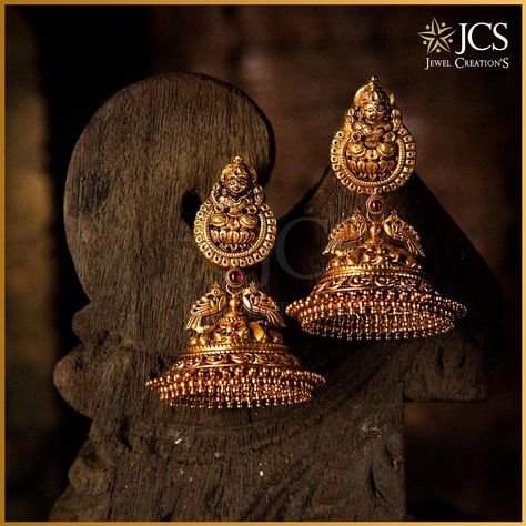 The rhythmic sway of these beautiful Jhumkas will bring out the emotions of a south Indian woman! #JCSJewelCreations #CelebratingTradition… Bridal Jewellery Indian Kundan, Temple Jewellery Earrings, Gold Earrings Indian, Gold Jhumka Earrings, Gold Temple Jewellery, Gold Earrings Models, Gold Necklace Indian Bridal Jewelry, Jewellery Indian, Antique Jewelry Indian