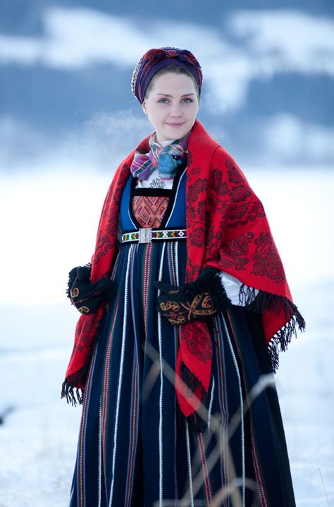 Fending off the snowy chill in a beautiful traditional Scandinavian Folk Costume. #Scandinavian #traditional #costume #clothing #folk #dress #travel #woman Folklore Fashion, Costumes Around The World, Folk Clothing, National Dress, Mode Boho, Folk Dresses, We Are The World, Ethnic Dress, Traditional Fashion