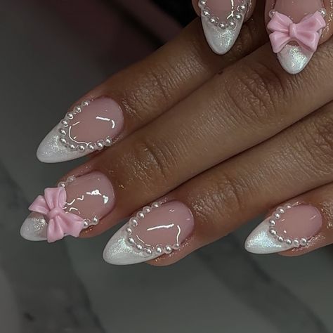 Coquette 🎀 🤍 . . . . . . . . . . . . . #coquette #coquettenails #acrylic #acrylicnails #acrylicnaildesign #nails #nailday #nailsofinstagram #nailart #trendynails #lasvegasnailtech #lasvegasnails Cute Vintage Nails, Friendsgiving Nails, Marie Antoinette Inspired Nails, Almond Nails With Bow Charm, Black And White Coquette Nails, Bow Almond Nails, Simple Coquette Nails, Coquette Almond Nails, Couqutte Nails