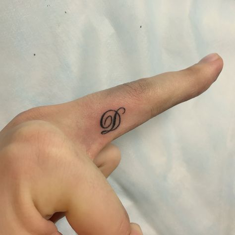 D Name Tattoo Design, D Alphabet Tattoo, Letter D Finger Tattoo, Letter D Tattoos Initials Small, Dhruv Name Tattoo, The Letter D Tattoo, Small D Tattoo Letter, Tattoo Of Initials, D Finger Tattoo