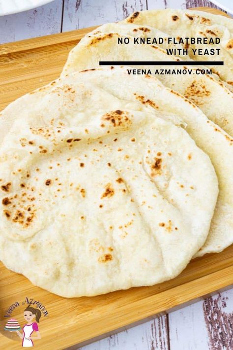 This flatbread recipe uses six ingredients including yeast and needs only 30 minutes to rise. You don't need to knead it and yet it produces a soft, tender flatbread that's perfect for wraps and spreads as well as with BBQs and grills such as shawarma or hummus. #flatbread #flatbreadrecipe #bread #flatbread #breadrecipes #nokneadflatbread Soft Flatbread Recipe, Shawarma Bread, Hummus Flatbread, Quick Flatbread, Easy Flatbread Recipes, Challah Bread Recipes, Recipes With Yeast, Easy Flatbread, Pita Bread Recipe