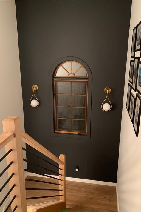 Staircase with black wall Behr Paint Colors Cracked Pepper, Black Pepper Benjamin Moore, Cracked Peppercorn Paint Color, Behr Peppery Paint, Cracker Pepper Behr Paint, Cracked Pepper Bathroom, Behr Dark Secret, Accent Wall On Staircase, Cracked Pepper Behr Paint Accent Wall