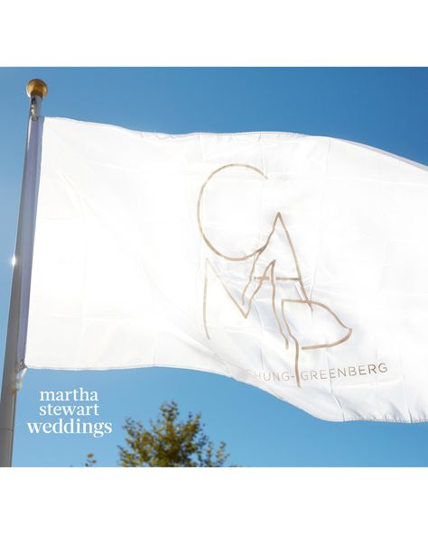 The day of the wedding, the couple's flag flew from a flagpole on the path to the ceremony, transforming the resort into Camp Chung-Greenberg (and echoing the design of the invitations). Signs For Wedding Ceremony, Yoko Ono And John Lennon, Rock Star Wedding, Welcome Ideas, Creative Wedding Sign, Wedding Flags, Troop Beverly Hills, Rock N Roll Wedding, Weekend Wedding