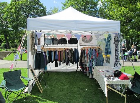 pretty Gala Shade market stall with vintage merchandise Clothes Stall Ideas, Flea Market Clothing Booth Ideas, Thrift Stall Ideas, Clothing Market Stall, Exhibition Stall Design For Clothes, Aesthetic Market Stall, Vintage Clothing Market Stall, Vendor Booth Display Ideas Clothing, Clothing Booth Display